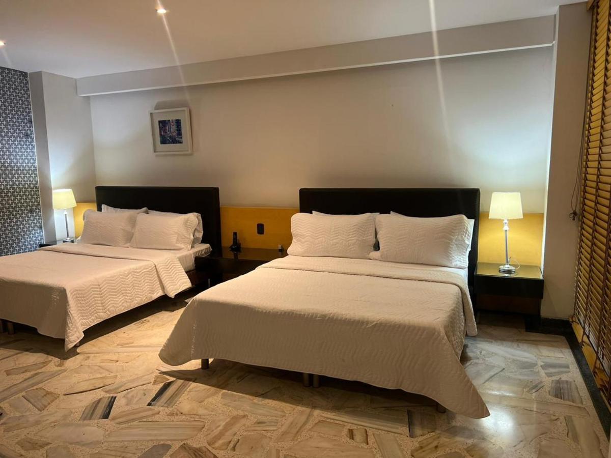 Aw Hotel Luxor Versalles كالي المظهر الخارجي الصورة